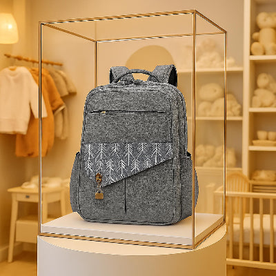 Sac à langer à dos gris vitrine verre boutique bébé