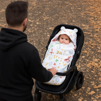 nid d ange papa promenade avec poussette et bébé