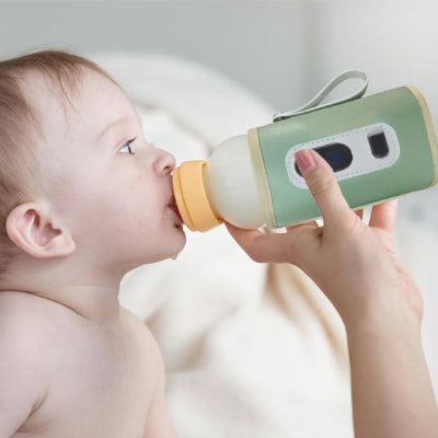 chauffe biberon nomade bébé boit biberon