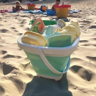 jouet de plage grand seau plein jouets sable bebe