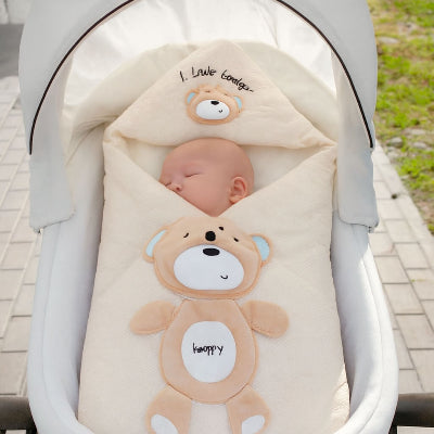 nid d ange bebe ours heureux beige