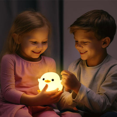 veilleuse bébé nomade canard enfant sourire